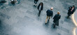 © Jacob Lund - People walking through a office hallway