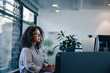 © Jacob Lund - Businesswoman busy working at her desk