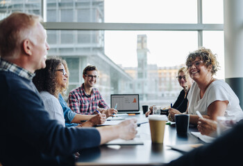 Wall Mural - Business people discussing new project in meeting