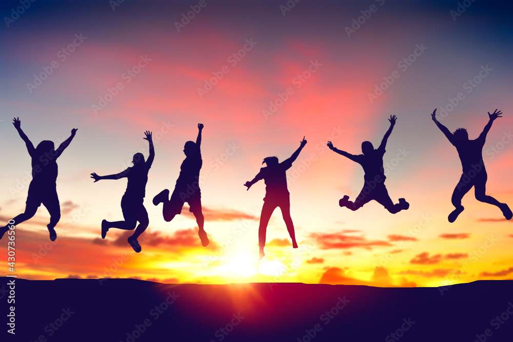Silhouette happy friends jump on sunset sky at top of mountain abstract background. - obrazy, fototapety, plakaty 