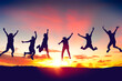 © tonktiti - Silhouette happy friends jump on sunset sky at top of mountain abstract background.