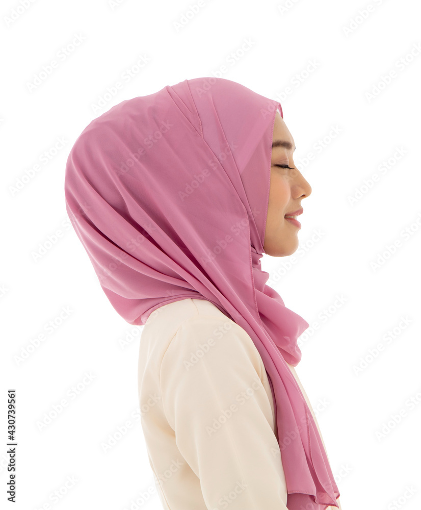 Side view portrait of asian islamic beautiful your female in pink hijab ...