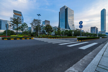 empty asphalt road with city skyline background in china