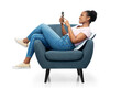 comfort, people and furniture concept - portrait of happy smiling young african american woman with smartphone sitting in modern armchair over white background