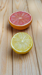 Wall Mural - Halves of lemon and grapefruit