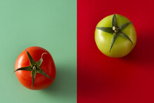 Red And Green Tomatoes On Red And Green Background
