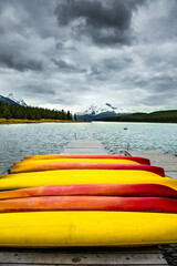 Poster - The canoes dry on the Lake Maligne