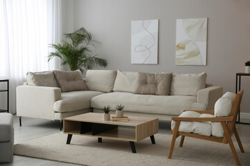 Big comfortable sofa in living room. Interior design