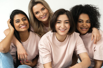 Wall Mural - multicultural diversity and friendship. group of different ethnicity women.
