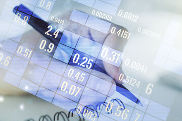 Multi exposure of stats data illustration with man hand writing in notebook on background, computing and analytics concept