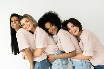 Wall Mural - Multicultural diversity and friendship. Group of different ethnicity women.