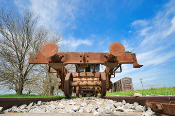 Poster - old train, in an abandoned station , parts from old wagon, old buffer in railway carriage