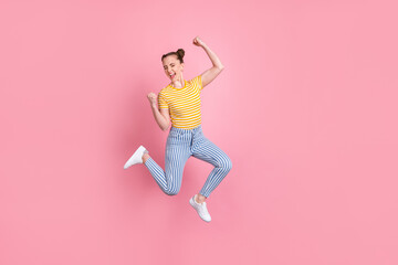 Poster - Full body photo of delighted lady closed eyes open mouth fists up celebrate triumph isolated on pink color background