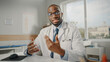 © Gorodenkoff - Doctor's Online POV Medical Consultation: African American Physician is Making a Video Call with a Patient. Black Health Care Professional Giving Advice, Explaining Test Results. Point of View Shot