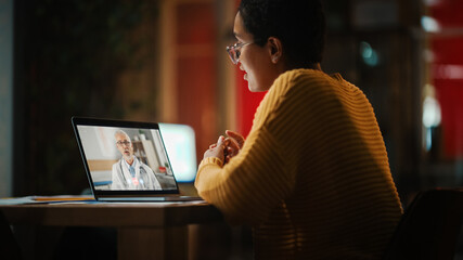Poster - Beautiful Multiethnic Latin Female is Making a Video Call to a Doctor on Laptop Computer in Creative Home Environment. Female Specialist Talking to a Patient Over a Live Camera about Test Results.