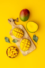 Canvas Print - Breakfast with mango fruits. Tropical fruits background. Top view