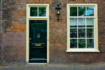 Wall Mural - Old house door and window. Delft, Netherlands