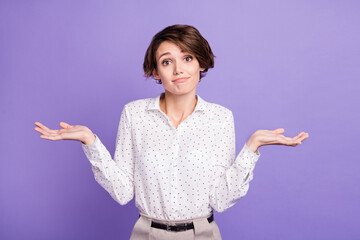 Sticker - Portrait of attractive unsure girl executive manager shrugging shoulders isolated over bright violet purple color background