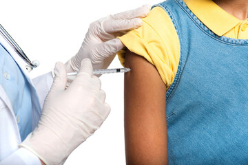 Wall Mural - Cropped view of doctor in latex gloves doing vaccination of african american child isolated on white