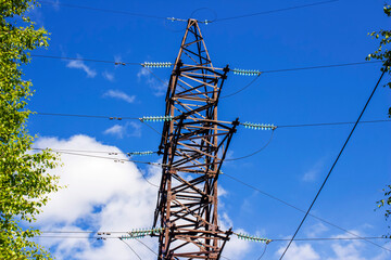 High-voltage tower with wires. Side view