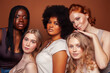© iordani - young pretty caucasian, afro, scandinavian woman posing cheerful together on brown background, lifestyle diverse nationality people concept