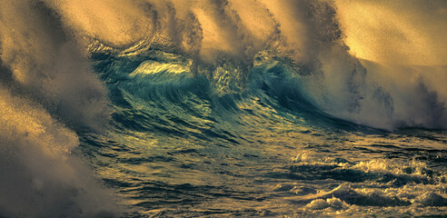 Wall Mural - storm in the ocean with big waves and emerald sunset color on background