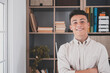 © Daniel - Portrait of one young and happy cheerful man smiling looking at the camera having fun. Headshot of male person working at home in the office..