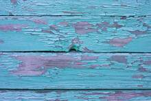 Background Of Wooden Planks With Peeling Blue Paint