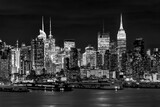 Fototapeta Miasto - West New York City midtown Manhattan skyline view from Boulevard East Old Glory Park over Hudson River at dusk.