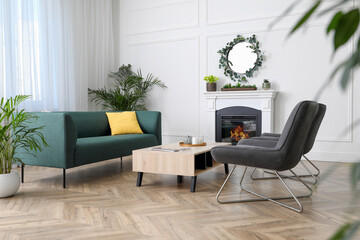 Sticker - Stylish living room interior with comfortable sofa and armchairs