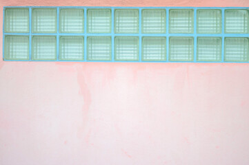 Pink walls and pastel blue glass niche