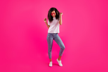 Wall Mural - Full length body size view of pretty cheerful girl dancing having fun isolated over vivid pink fuchsia color background