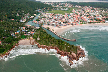 Wall Mural - aerial image with drone from the beach Barra da Lagoa on the island of Florianópolis Santa Catarina Brazil at dawn