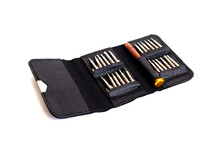 A set of screwdrivers in a leather case isolated on wite background