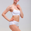 © Nobilior - Beautiful slim woman in white lingerie