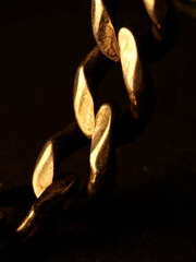 Abstract background of a silver chain, selective focus