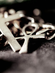 Abstract background of a silver chain, selective focus