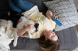 Attractive young woman with Australian shepherd dog With phone