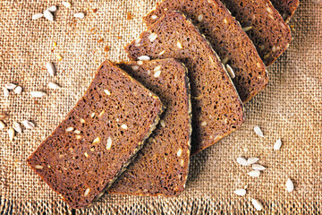 Rye bread baked with sunflower seeds and linseeds. Top view.