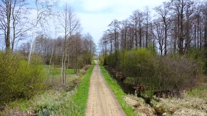 Canvas Print - 4k video of road among flooded meadows after spring downpours in Wegrow County, Masovian Voivodeship of Poland