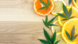 Cannabis Terpene concept with leafs lemon orange and blood orange and copy space