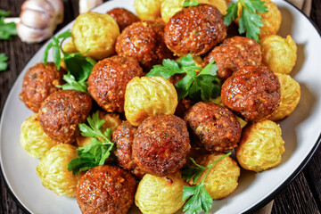 Poster - Italian meatballs and pasta balls on a plate