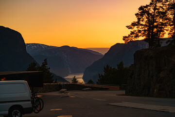 Poster - Van on parking area at Stegastein viewpoint Norway