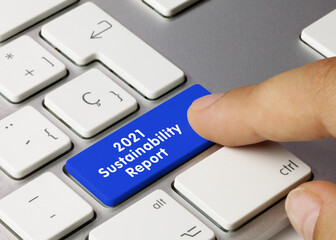 Wall Mural - 2021 sustainability report - inscription on blue keyboard key.