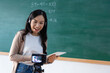 © JR-50 - teacher talk in classroom giving virtual teaching remote class online