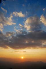 Wall Mural - Nature Sky and White Clouds Texture Background - with orange light of sunset 