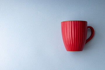 Poster - Top view of a cup of hot coffee isolated on a gray background