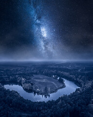 Wall Mural - milky way over river at night. wildlife in poland, europe