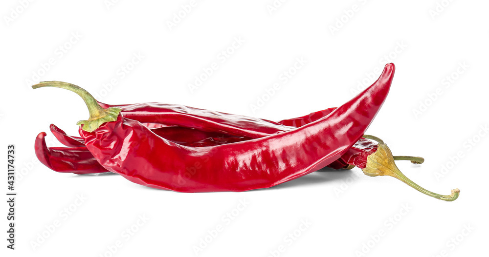 Dry chili peppers on white background