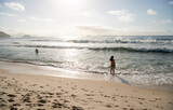Fototapeta Konie -  Citizens swim and sunbathe on the beach of Copacabana